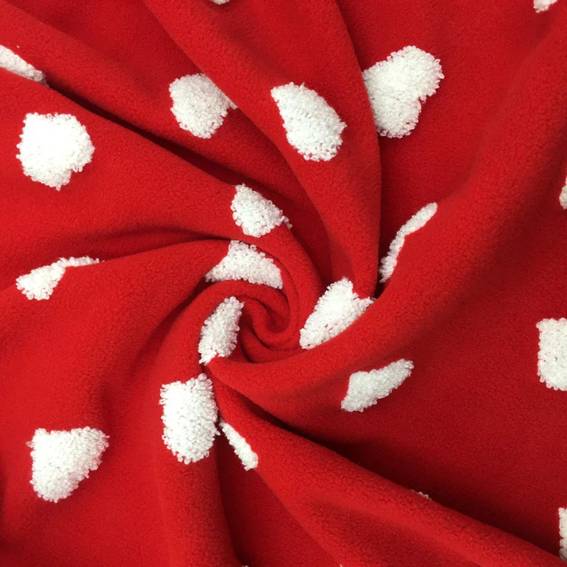 Tissu polaire à motifs cœurs au mètre