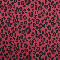 Flanelle de coton léopard au mètre Longon Craft France : tissu flanelle audacieux rose à motif léopard noir, parfait pour robes, blouses et chemises d'hiver.