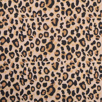 Découvrez Flanelle de coton léopard au mètre de Longon Craft France : un tissu flanelle audacieux avec motif léopard noir et brun sur fond beige, idéal pour robes, blouses ou chemises confortables en hiver.