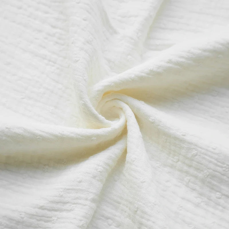 Double gaze de coton plumetis au mètre