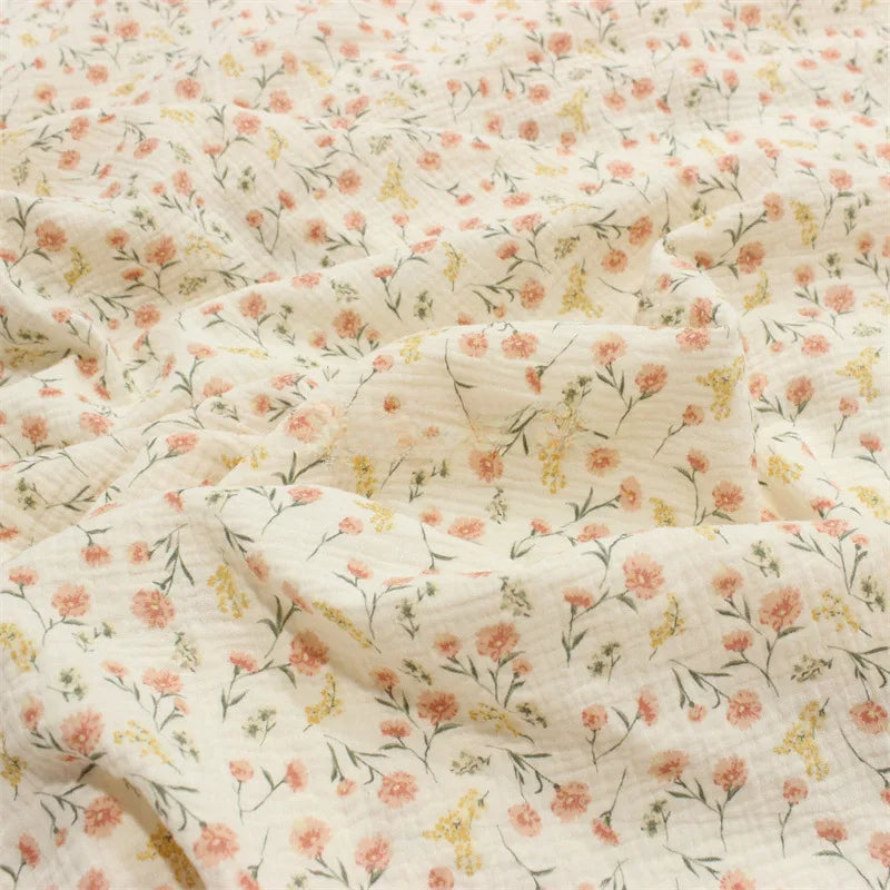 Double gaze de coton imprimée petites fleurs au mètre