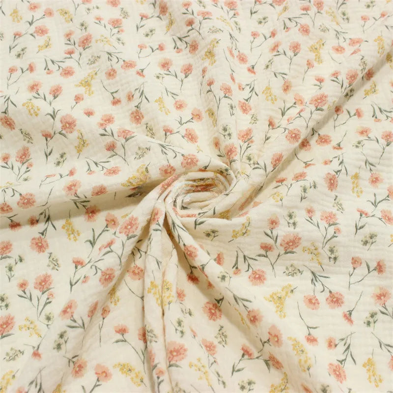 Double gaze de coton imprimée petites fleurs au mètre