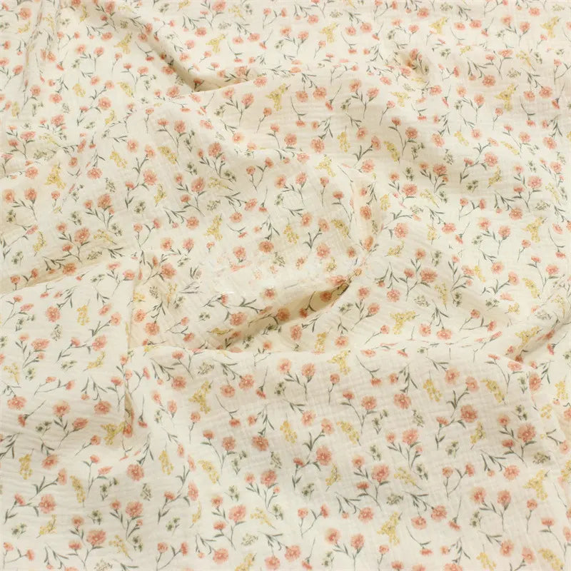 Double gaze de coton imprimée petites fleurs au mètre
