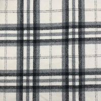 Découvrez le tissu en flanelle à carreaux noir et gris sur fond blanc de Longon Craft France, idéal au mètre pour des vêtements d'automne confortables : robes, chemises et projets couture en polyester-coton.