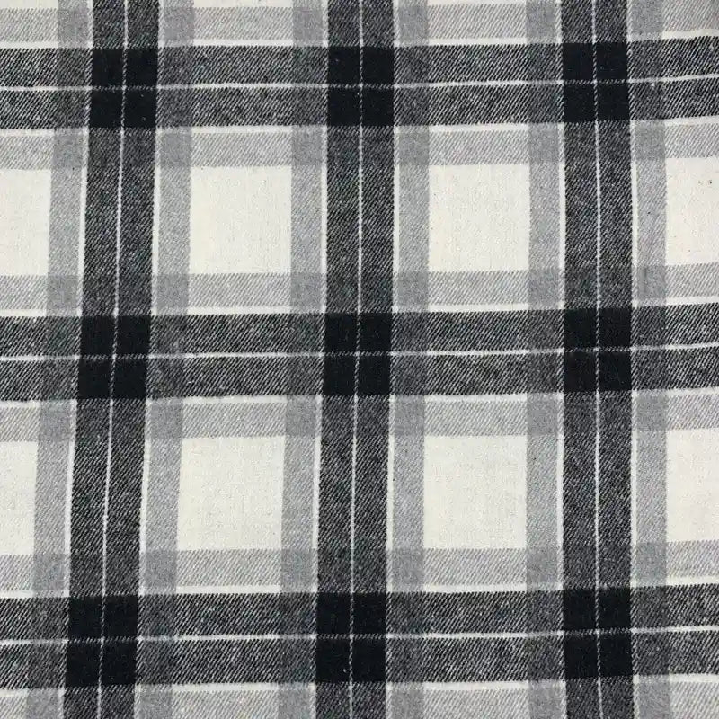 Découvrez le tissu flanelle à carreaux polyester-coton de Longon Craft France, vendu au mètre : confortable et idéal pour robes, chemises ou couture automnale. Motif noir, gris et blanc parfait pour vêtements d'hiver.
