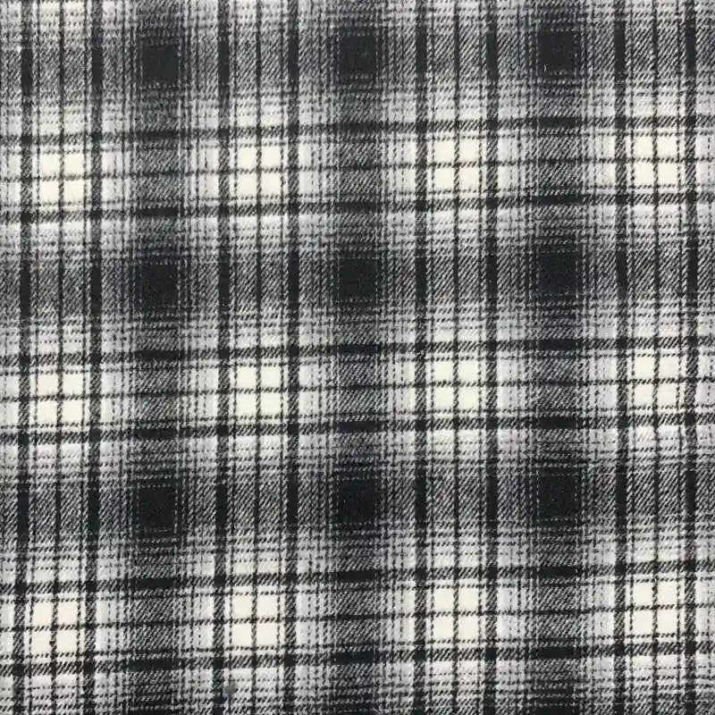 Longon Craft France propose un tissu en flanelle à carreaux polyester-coton, idéal pour l'automne. Parfait pour robes, chemises ou projets de couture d'hiver. Vendu au mètre, il combine confort et style classique à carreaux.