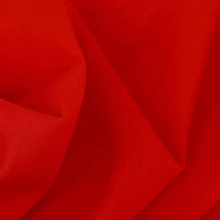 Gros plan sur le Tissu voile rouge en rayonne au mètre de Longan Craft France, montrant sa texture et son tissage légers et respirants - idéal pour coudre des vêtements, des doublures, des nappes ou des rideaux.
