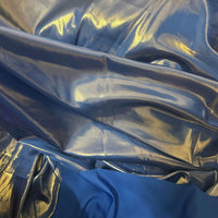Le Tissu satin lamé au mètre de Longan Craft France, en polyester métallisé et brillant, offre des reflets bleus éclatants-idéal pour la couture, les robes DIY ou costumes de scène.