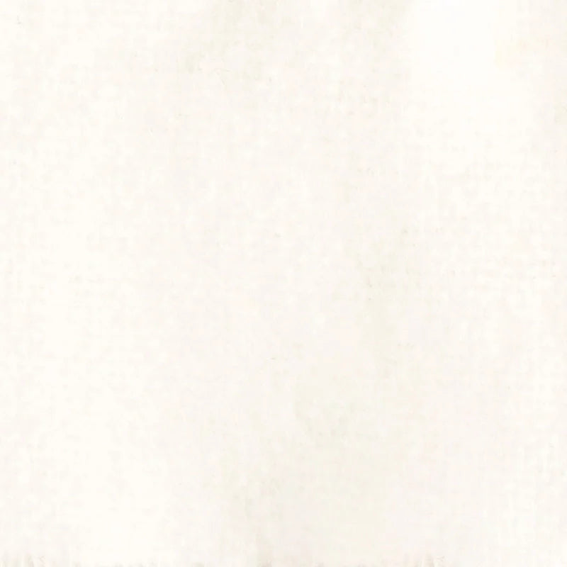 Flanelle de coton uni au mètre de Longon Craft France : une flanelle unie, blanc cassé, super douce, parfaite pour l'automne et les câlins - aucun motif ou marquage visible.