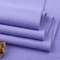 Tissu en polaire épais uni au mètre