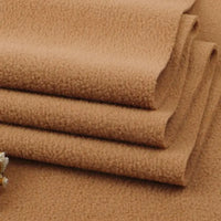 Tissu en polaire épais uni au mètre