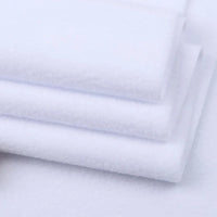 Tissu en polaire épais uni au mètre