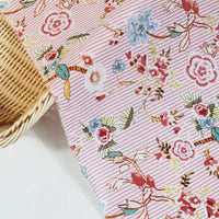 Tissu voile de coton rayé à fleurs au mètre