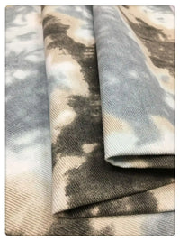 Découvrez de près le Tissu denim en coton tie-dye au mètre 10 oz de Longan Craft France : un denim coloré gris, noir et blanc à motif imprimé, idéal pour une touche moderne dans votre décoration intérieure ou la création de vêtements tendance.