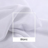 Gros plan sur le Tissu velours uni au mètre de Longan Craft France, un tissu velours blanc doux et luxueux (165 cm de large) destiné à l'habillement et aux projets créatifs. Des plis subtils apparaissent à l'intérieur d'un carré portant l'inscription "Blanc".